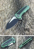 WE KNIFE Co Valiant Frame Lock Gree Titanium Handle Folding Black Blade Knife 717E